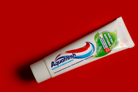 April 20, 2023 Ukraine city Kyiv Aquafresh toothpaste on a colored backgroundのeditorial素材