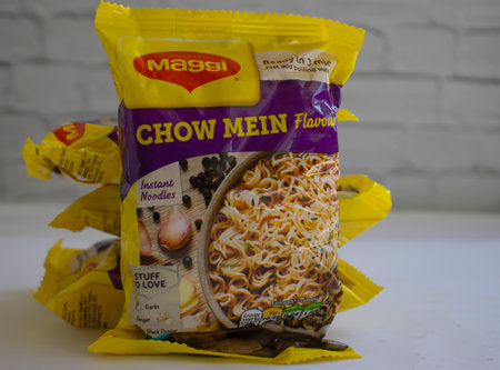 April 22, 2022 Ukraine city Kyiv Maggi noodles on a light backgroundのeditorial素材