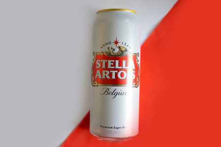 May 14, 2022 Ukraine city Kyiv beer in an iron can Stella Artois on a colorful mfonのeditorial素材