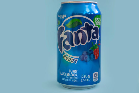 May 18, 2022 Ukraine city Kyiv jar Fanta cherry drink on a colored background