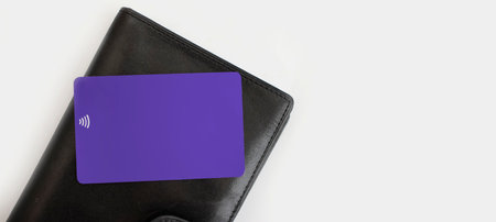 Wallet, bank card on a colored background