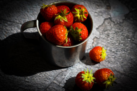 Fresh strawberries on old backgroundの写真素材