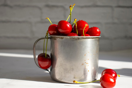 Fresh cherries on old background
