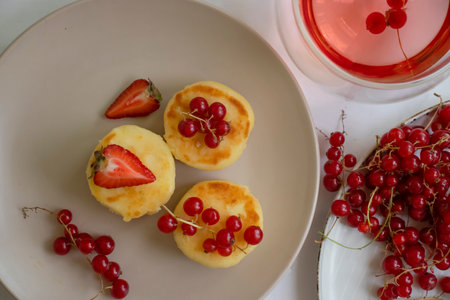 Cheesecakes with berries on a plate