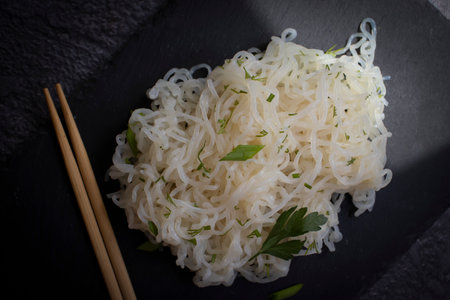 Shirataki noodles on dark backgroundの写真素材