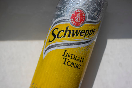 July 26, 2023 Ukraine city Kyiv wet iron can of Schweppes drinkのeditorial素材