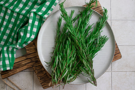 Bunch of fresh rosemary on old backgroundの写真素材