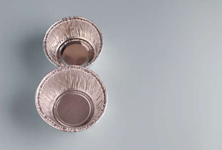 Round shape aluminum foil containers for food preparation. Eco-friendly figure eight boxes. Copy...