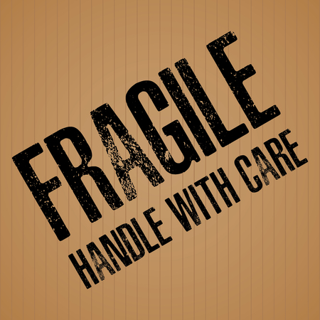 Fragile Black text on brown cardboard texture background.のイラスト素材