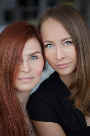Two friends european girls with natural make-upの写真素材