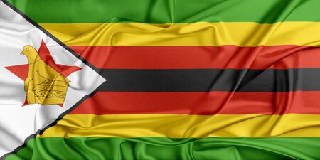 Flag of Zimbabwe waving in the windの写真素材