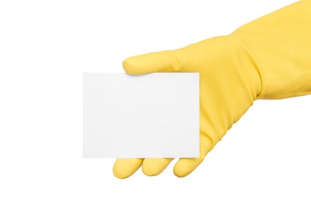 Card in the hand with the glove. Isolated on white background.の写真素材