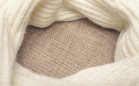 White scarf on sackcloth. Background for your text placement.の写真素材