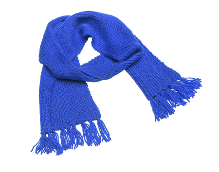 Blue knitted scarf on a white background.の写真素材