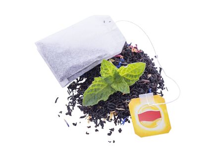 Leaf tea and tea a packet on a white background.の写真素材