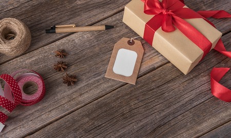 Christmas gift with a greeting card. New Year still life.の写真素材