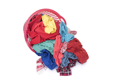 Basket of dirty laundry. Isolated on white background.の写真素材