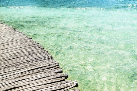 Wooden bridge over the water.