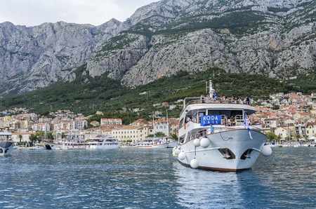Makarska city croatia port quay.- JUNE 1: The city of Makarska is a Croatian port of the embankment, a view from the sea, June 1, 2017. Croatia.のeditorial素材