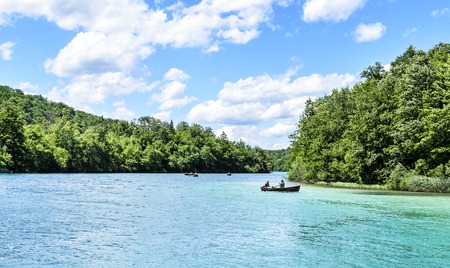 Boat on the Plitvice Lakes - JUNE 29: Boat on the Plitvice Lakes on a summer day. June 29, 2017. Croatia. Plitvice Lakes.のeditorial素材