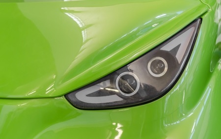 Car headlight. Close-up.