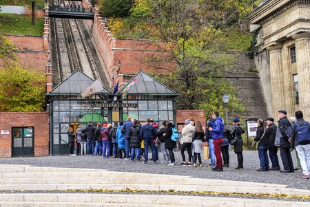 Tourists wait in line to buy tickets for the funicular. Budapest, Hungary.のeditorial素材