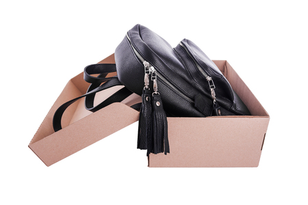 Leather backpack in a cardboard box.の写真素材