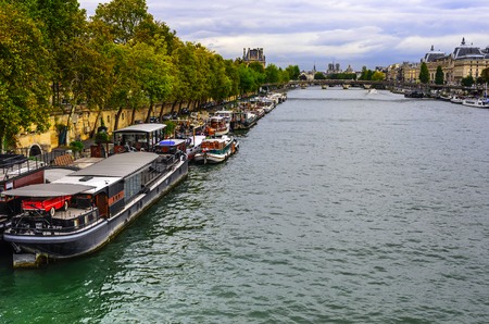Pleasure boats on the river Seine in Paris.のeditorial素材