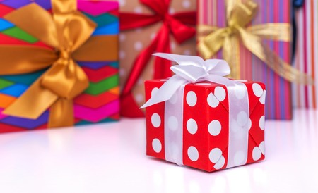 Pile of gifts on white background. Close-up.