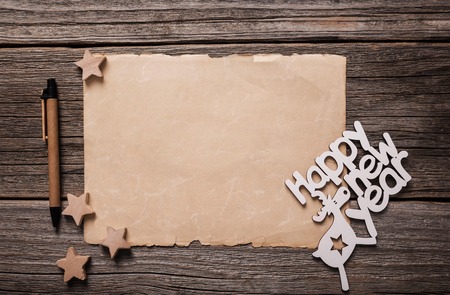 Happy New Year greeting cards. Composition on wooden boards.の写真素材