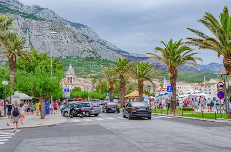 Streets of the resort town of Makarska summer day.