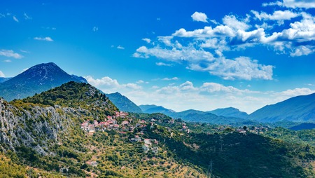 Rocky Mountains on the horizon in desert with summer colors.の写真素材