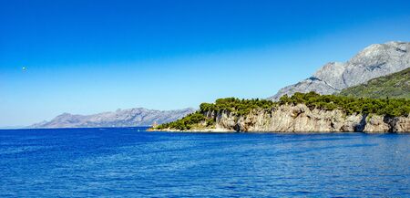 View of the resort town of Makarska on a summer day, in Makarska Riviera, Croatia.のeditorial素材