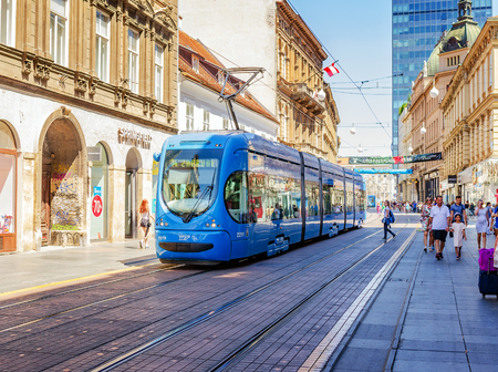 ZAGREB, CROATIA - JULY 17, 2017: Square Ban Josip Jelacic with tourists and trams on a summer day in Zagreb. City of Zagreb is the capital of Croatia.のeditorial素材