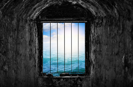 Dungeon with window and bars.