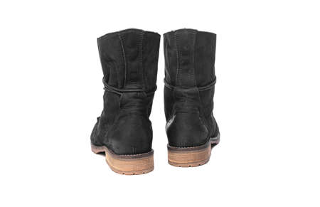 Black female winter boots isolated on a white background.の写真素材
