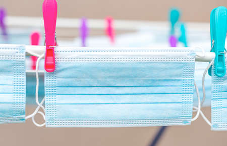 Medical masks are dried after washing.の写真素材