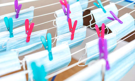 Medical masks are dried after washing.の写真素材