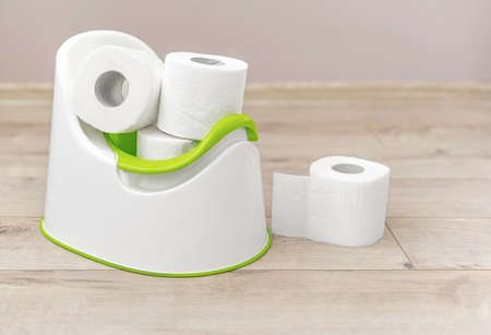 Baby potty and toilet paper.の写真素材