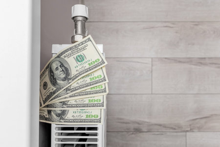 Dollars lie on the radiator.の写真素材