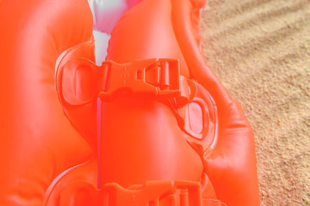Fasteners on a childrens inflatable life jacket.