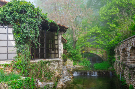An ancient house in the fog.の写真素材