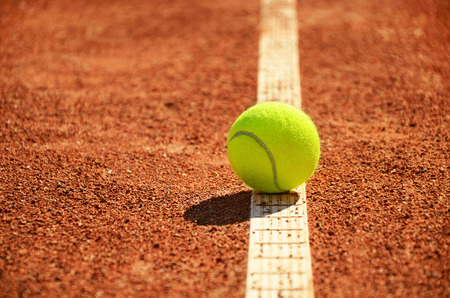 tennis ball is on the markup horizontal  low angleの写真素材