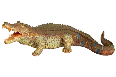 figurine crocodile isolated on white backgroundの写真素材