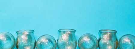 Layout glass medical banks lie on a blue background top viewの写真素材