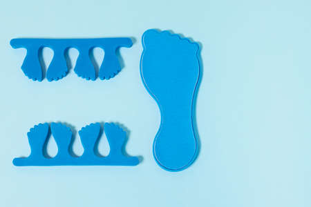 pedicure kit. Finger separators and pedicure grater. top viewの写真素材