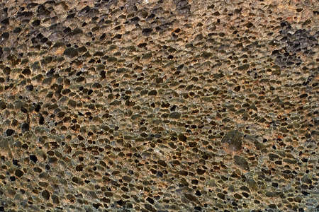 Black pumice stone texture for foot care, close-up, horizontal formatの写真素材
