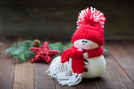Snowman on wooden table. Christmas decoration. Copy space.の写真素材