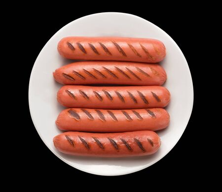 Grilled sausages on white plate. Top view. Clipping path. Blackの写真素材