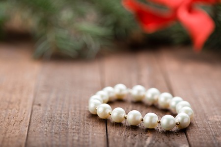 Pearl beaded bracelet. Gift. Christmas decoration. Copy space. Valentine. Love.